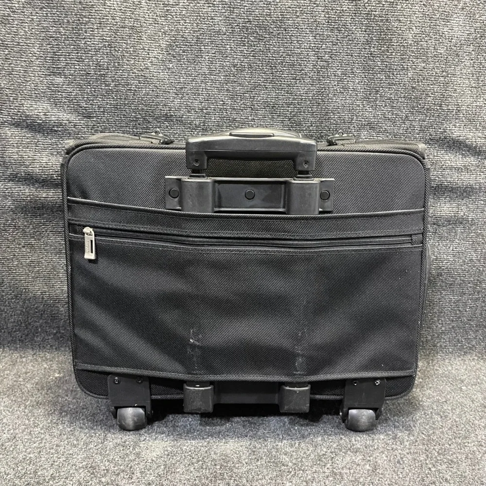 US Luggage New York Black Ballistic Nylon Rolling Catalog Case Wheeled Briefcase